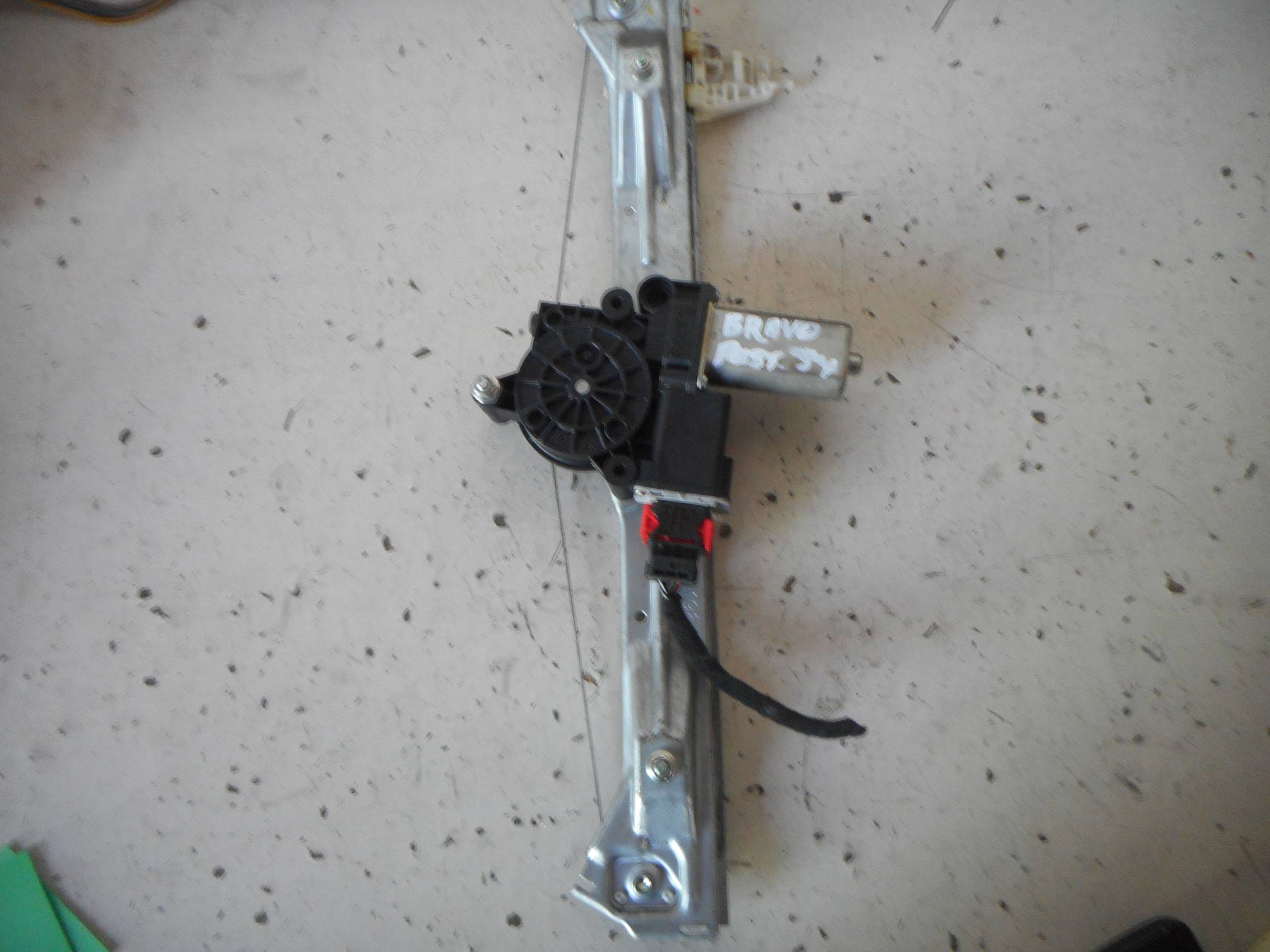 Alzacristallo elettr. porta post. sx.